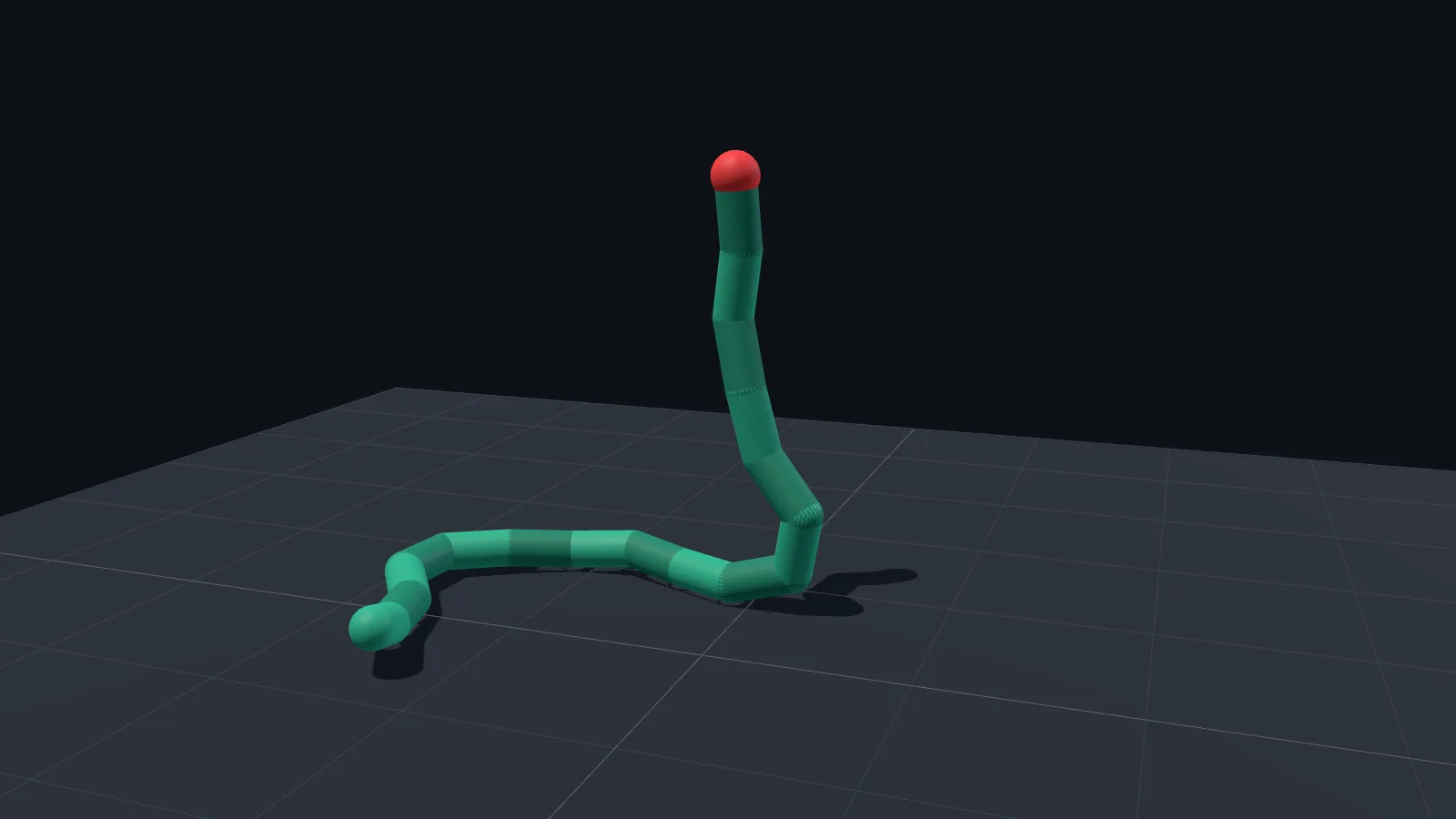 A green chain of 16 links lying on a floor with its far end reared upright.